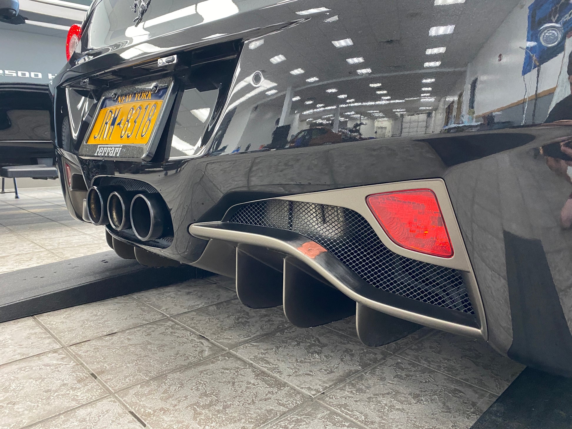 This Ferrari 458 Italia owner needed a repair and wanted to wrap vs paint. Luckily our Matte Meteor Grey vinyl matched his diffuser perfectly